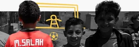 A stylised composite image shows a child from behind, in a short-sleeved red Liverpool jersey with "M Salah" on it, next to two smiling children, with their images turned black and white. In the background, a goalkeeper defending his net has been drawn in gold lines.