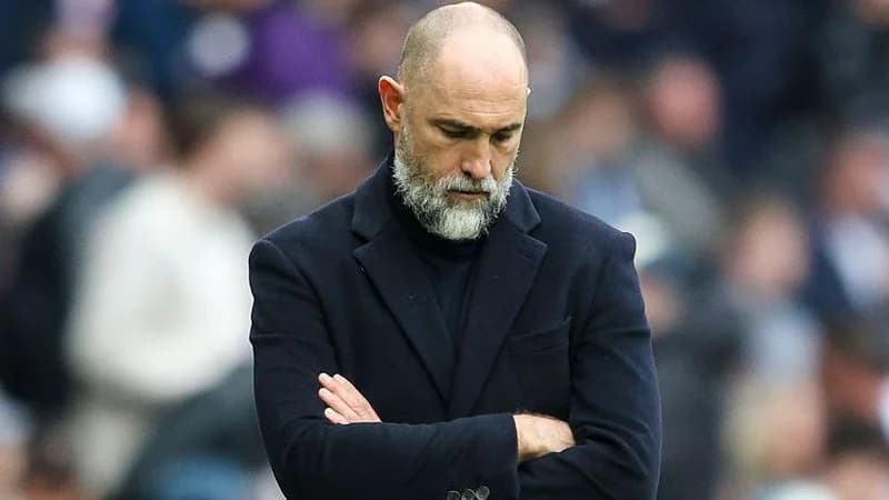 Igor Tudor looking at the floor during a Tottenham game.