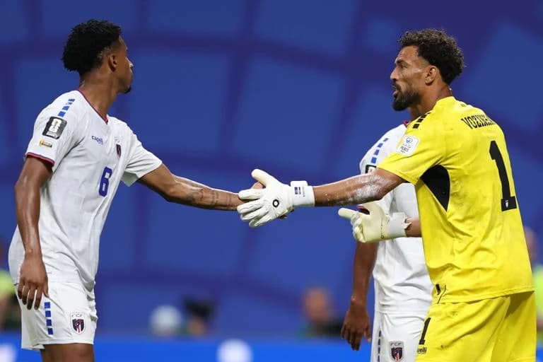 ATLANTA, GEORGIA - JUNE 15: Vozinha #1 of Cabo Verde reacts with Kevin Pina #6 after a save during the FIFA World Cup 2026 Group H match between Spain and Cabo Verde at Atlanta Stadium on June 15, 2026 in Atlanta, Georgia. (Photo by Maddie Meyer - FIFA/FIFA via Getty Images)