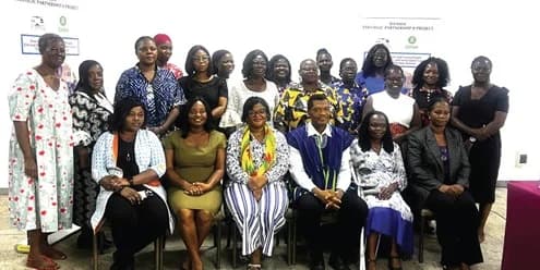 Melody Darkey (seated right), Executive Director, WiLDAF Ghana, with other participants after the meeting