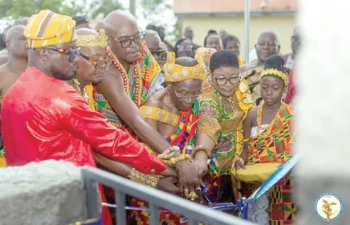 Ernest De-Graft Egyir (left), President of Mfantsiman Saltpond Development Alliance, and some representatives from the Nkusukum Traditional Council, commissioning the 50,000-litre automated water project for Saltpond Government Hospital