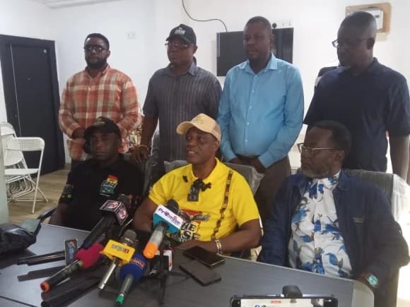 Mr Jacob Osei Yeboah (middle), Chief Operations Coordinator, the Base Ghana Movement, while addressing the media.