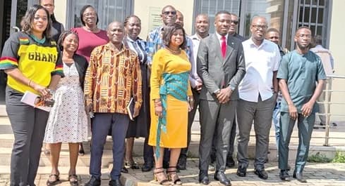 Ignatius Godfred Dordoe (3rd from right), DCE of Shai-Osudoku, and officials from the assembly at the programme