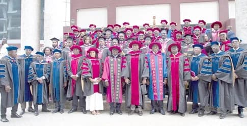 Dr Joseph Whittal (arrowed middle), Commissioner of CHRAJ, together with Board members of the Nobel International Business University, and graduates after the event