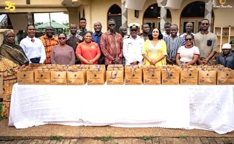 Ekua Zara Ghartey-Tsagli (2nd from right), Head of Marketing, Labadi Beach Hotel, and Lt Mohammed Bisbao Said (3rd from right), Assistant Director of Religious Affairs at the Ghana Navy Headquarters, with staff of the hotel and some worshippers at the Al Aziz Central Mosque