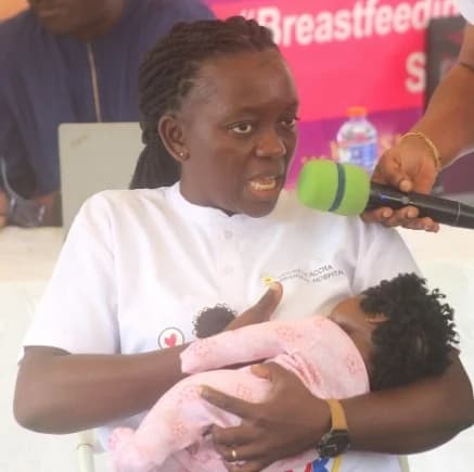 Dorcas Asante, Principal Nutrition Officer at GARH, demonstrating how mothers should position their babies before breastfeeding. Picture: ESTHER ADJORKOR ADJEI