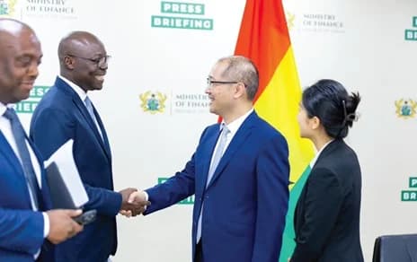Dr Cassiel Ato Forson (2nd from left), Minister of Finance, welcoming Zhang Li (2nd from right), China's Assistant Minister for Commerce, to the meeting. Looking on is Thomas Nyarko Ampem (left), Deputy Minister of Finance