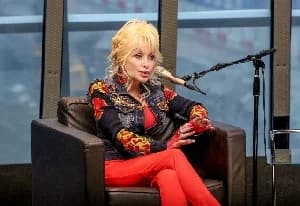 Dolly Parton’s Imagination Library Expands Global Literacy Impact Inspired by Father’s Legacy