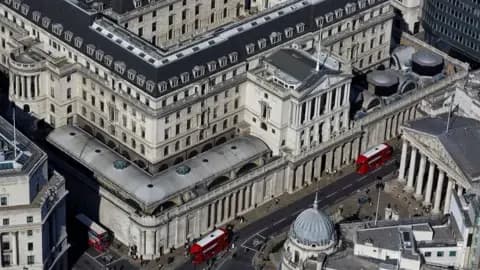 Getty Images The Bank of England in the city of London holds tonnes of gold bars in its vaults. This is an aerial view of the bank which is a historic building.