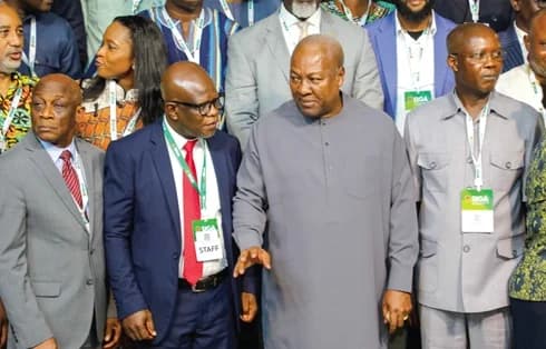 President John Dramani Mahama interacting with Prof. Michael Kpessa-Whyte (2nd from left), Director-General, SIGA, at the conference. With them are Bernard Ahiafor (right), First Deputy Speaker of Parliament, and Seth Terkper (left), Presidential Advisor on the Economy. Picture: ELVIS NII NOI DOWUONA