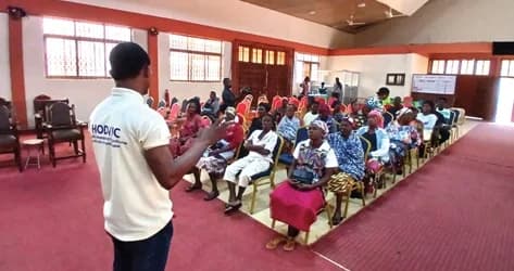 Emmanuel Nana Osei educating parents on how to take good care of their children eyes.