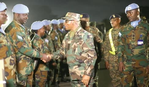 Major General Lawrence Gbetanu (arrowed), Chief of Army staff, congratulating the peace keeping officers from Lebanon. Picture: BENEDICT OBUOBI