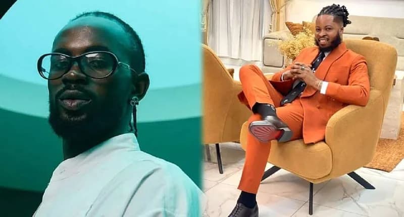 A composite image featuring Ghanaian musician Black Sherif on the left in a close-up shot wearing thick-rimmed glasses and a teal-tinted light. On the right, a man in an orange suit, identified as Sam Creatives, is seated in a modern armchair within a well-lit indoor setting.