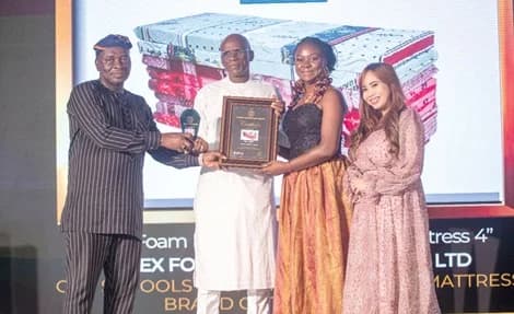 Dr Yakubu Diomande (2nd from left), Export Manager, Gifty E. Appiah (3rd from left), the Public Relations Officer, and Kaye Ariane Turgo, Assistant Showrooms Manager of Latex Foam, receiving the award from Dr Issahaque Munawaru, Deputy Director-General, Quality and Access, Ghana Education Service