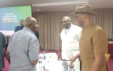 Jabesh Amissah-Arthur (right), Board Chairman, VRA, interacting with Alhaji Collins Dauda (left), Member of Parliament, Asutifi South Constituency, and Edward Ekow Obeng-Kenzo (middle), Chief Executive, VRA, after the VRA's 16th stakeholders interface and annual general meeting