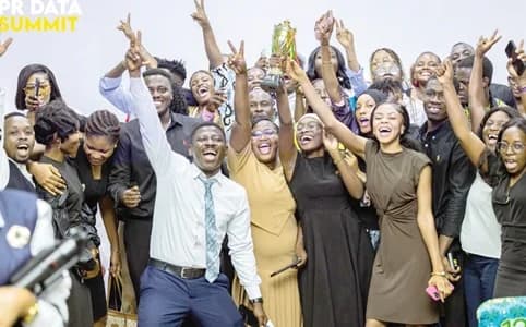 Akosua Kwafo Ogyiri (2nd from left), Communications and Advocacy Professional, Richard Sarkodie-Abebreseh (left), Founder and COO, Goodwill Insurance Brokers, and overall winners of the competition after the trophy was handed over