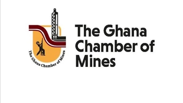 The official logo of The Ghana Chamber of Mines set against a solid white background. The logo includes a graphic emblem with a mining rig and a silhouette of a miner, accompanied by the organization's name in bold black typography.