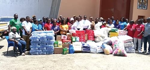 St Luke Anglican Church members and prison officers with the donated items at Nsawam Prison