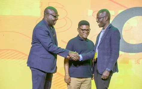 Eyram Tawia (left), CEO and Co-Founder, Leti Arts, in a handshake with Patrick Awuah, President, Ashesi University, after signing the agreement. With them is Dr Bless Sefenu Agordjo, Senior Manager, Digital Services and Verticals, MTN Ghana. Picture: DOUGLAS ANANE-FRIMPONG