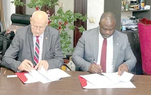 Dr Martin Luther Obeng (right), President of Radford University College, signing the agreement with Prof. Dr Dragan Djuri, President of Singidunum University in Belgrade