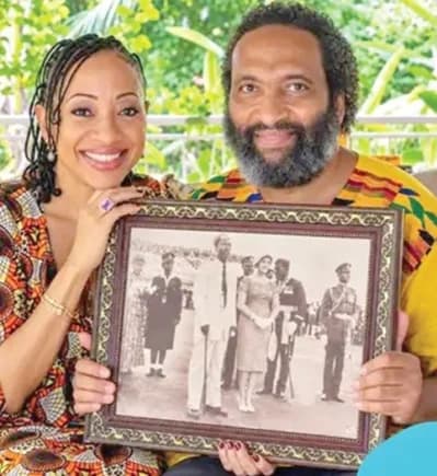 Gamel Gorkeh Nkrumah and his sister, Samia with a framed photo of their parents, Dr Kwame and Fathia Nkrumah at a state function