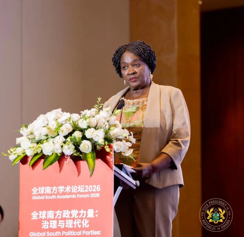 Vice President of Ghana, Prof. Naana Jane Opoku-Agyemang, is pictured delivering a speech at the Global South Academic Forum 2026. She stands at a red podium decorated with white flowers, with the official seal of the Vice President of the Republic of Ghana visible in the bottom right corner.