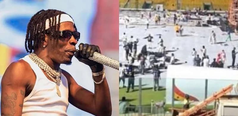 The image is a composite featuring Ghanaian musician Shatta Wale on the left and a wide shot of the Accra Sports Stadium on the right. Shatta Wale is seen in a white tank top and headband holding a microphone, while the stadium side shows numerous people on the pitch area, likely participating in the cleaning exercise mentioned in the news.
