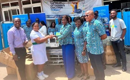 Lawrencia Akweley Turkson (2nd from left) receiving the medical items from Dr Abena Asomaning
