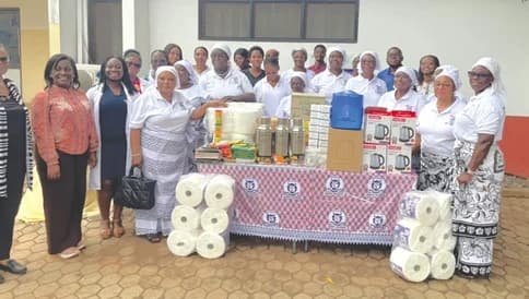 Members of the Women’s Fellowship of the Trinity United Church, Legon with staff of the Paediatrics Department of the University Hospital, Legon