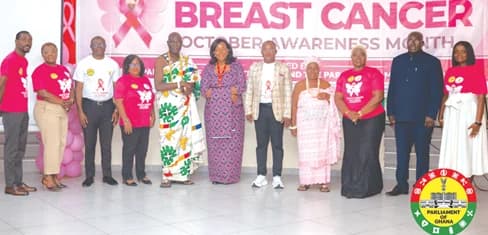 Ebenezer Ahumah Djeitror (5th from right), the Clerk to Parliament, with some guests at the event