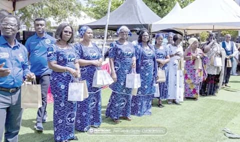 Some members of the Women Ministry of the Church of Pentecost presenting sanitary items to the pupils
