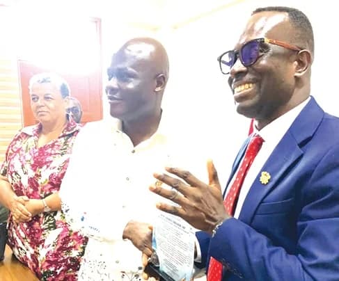 Sylvester Darko (right), Chief Executive Officer, HYDRO, presenting a plaque to Ahmed Ibrahim (2nd from right), Minister of Works, Housing and Water Resources, during his familiarisation visit to the HYDRO
