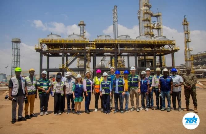 Edmond Kombat (4th from right), Managing Director, TOR, with some staff and members of the IMF team