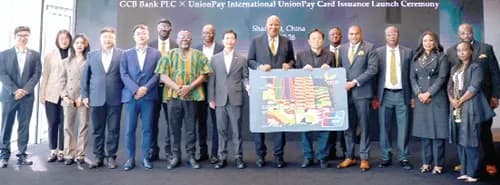 Prof. Joshua Alabi (middle), Board Chairman, GCB Bank; Farihan Alhassan (5th from right), MD, GCB Bank; Feng Chen, General Manager of UnionPay Africa, and teams from both banks