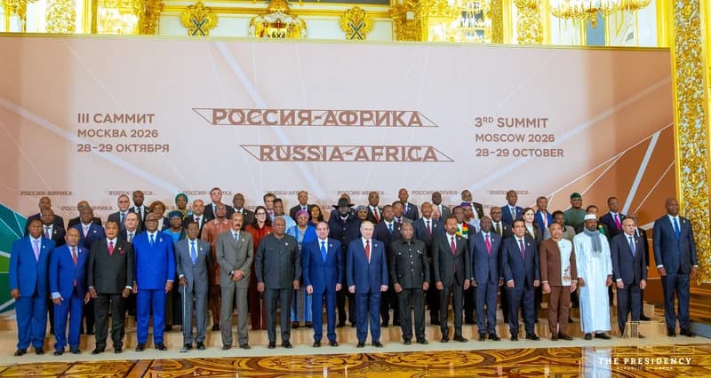 A group photograph of world leaders and heads of state at the 3rd Russia-Africa Summit held in Moscow in October 2026. President John Mahama of Ghana is prominently featured in the front row alongside Russian President Vladimir Putin and other African dignitaries in an ornate hall.