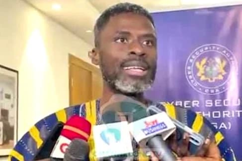 Martin Agyei Aboagye, Manager, Child Protection, Cyber Security Authority, explaining a point to some journalists at the event