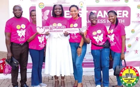 Dr Linda Baafi (3rd from left), Municipal Health Director of Klottey Korle, with some of staff of Parliament